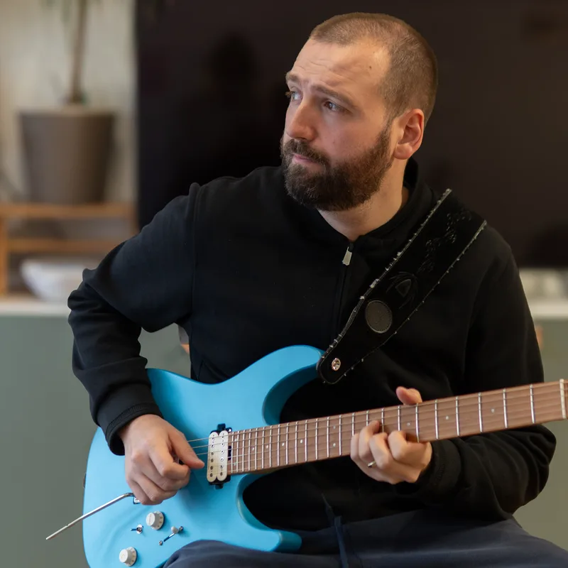 Playing guitar